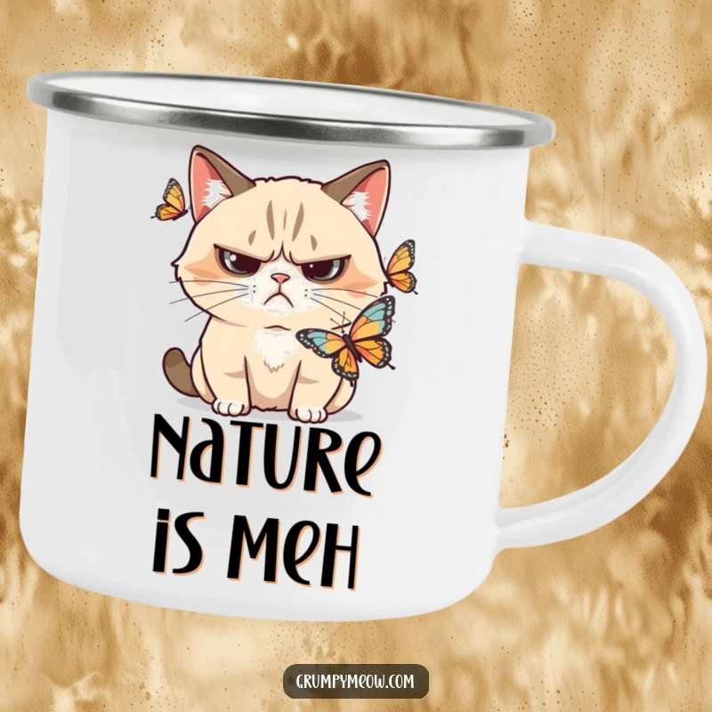 Funny grumpy cat camping mug, skeptical frown at a butterfly, embodying outdoor contemplation, a wonderful funny gift for campers.