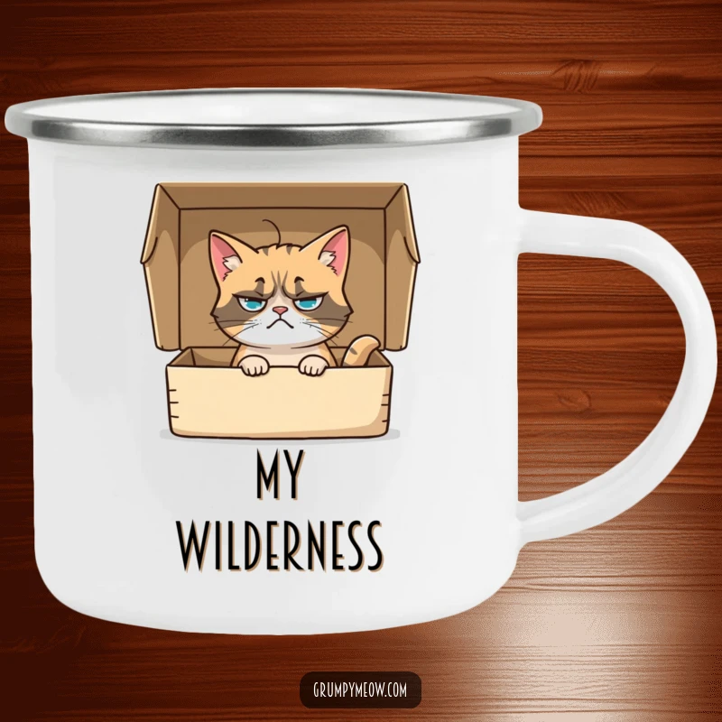 Funny camping mug with a grumpy cat sitting in a box, its whisker twitching with mild interest, perfect for outdoor humor adventures.