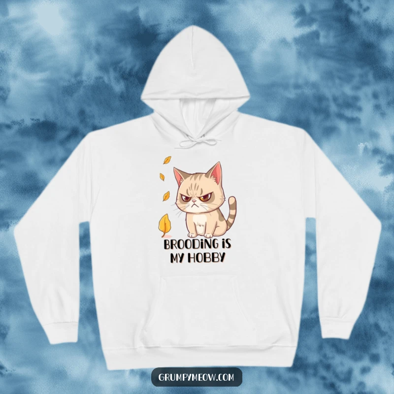 Funny Grumpy Cat Hoodie: Soft and warm, depicting a grumpy cat observing a falling leaf with intense focus.