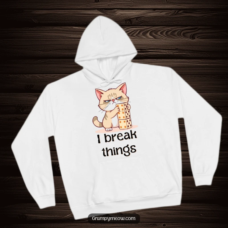 Funny grumpy cat hoodie, mid-push on a domino tower, radiating feline mischief, a perfect funny gift for cold days.
