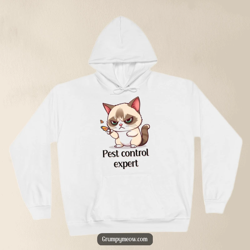 Funny grumpy cat disdainfully batting away a playful butterfly with one paw on a hoodie, for cozy annoyance, an ideal funny gift.