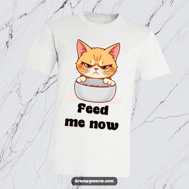 Funny grumpy cat t-shirt, unimpressed expression, judging an empty food bowl, demanding food, hilarious pet owner apparel.